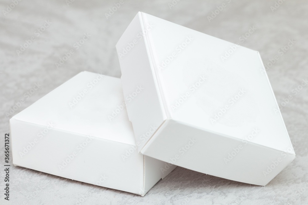 Two white boxes mock up on grey background