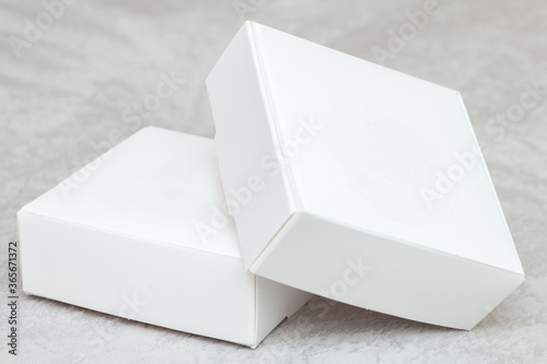 Obraz na płótnie Two white boxes mock up on grey background w salonie