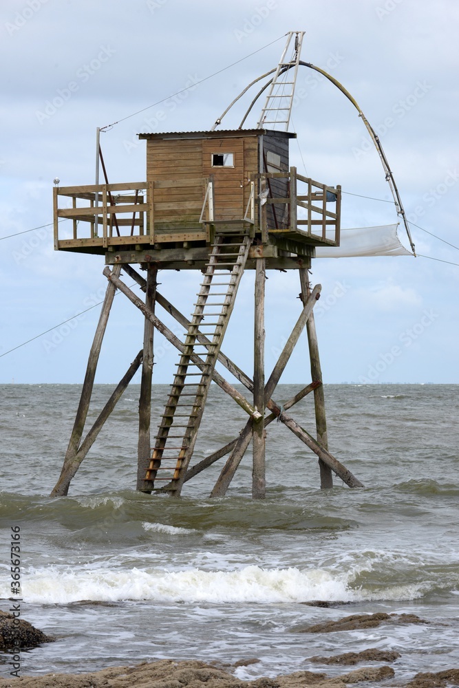 Carrelet fishing hut on Comberge beach in Saint-Michel-Chef-Chef ...