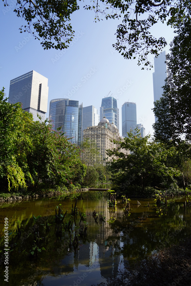 City skyline with an interesting cloudy sky behind. Panorama of full skyline with all the towers and buildings. City skyline with an interesting cloudy sky behind. Panorama of full skyline with all the towers and buildings.