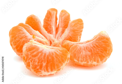 Peeled tangerine or mandarin fruit half isolated on white background cutout