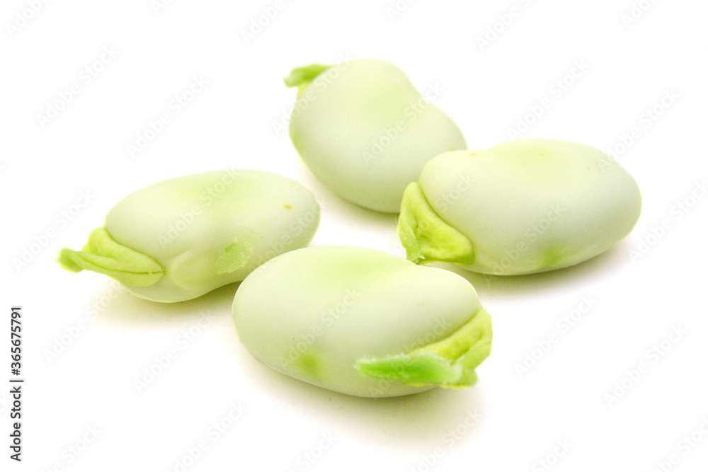 close up of fresh broad beans on white background close up of fresh broad beans on white background