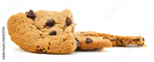 Closeup of crumbled chocolate chip cookie on white background