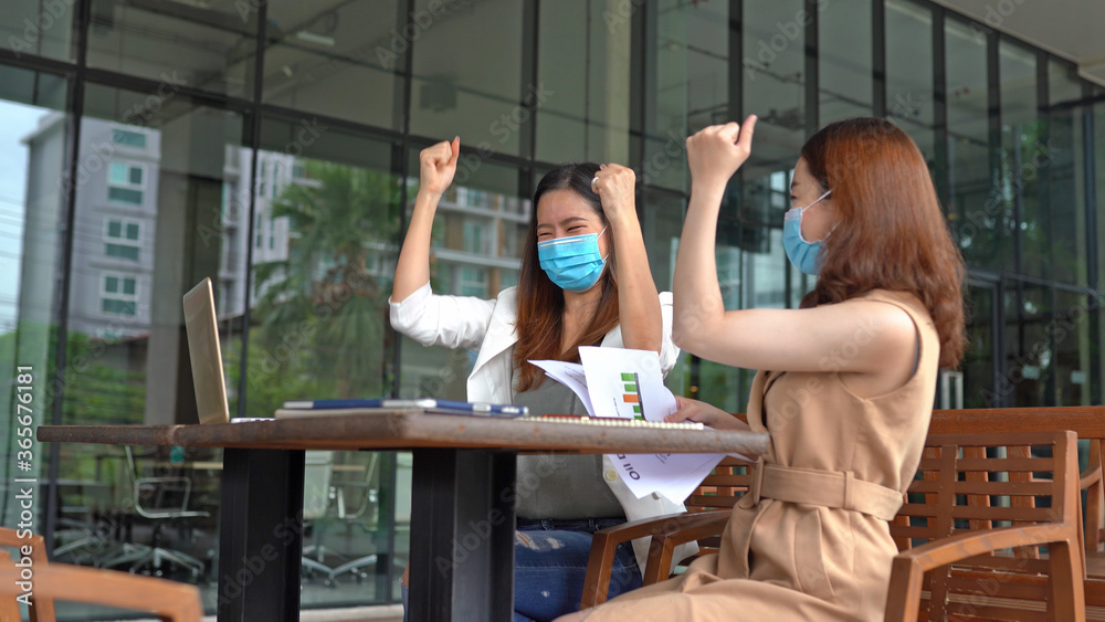 Business asian workers wear masks to protect and take care of their health