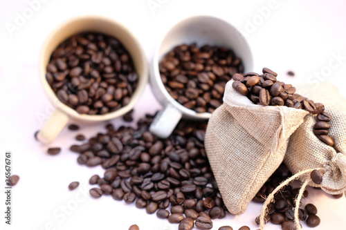 coffee beans on old wood table background, space for text