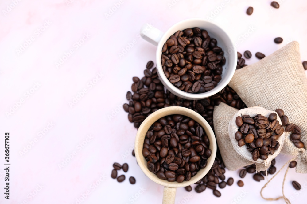 coffee beans on old wood table background, space for text coffee beans on old wood table background, space for text