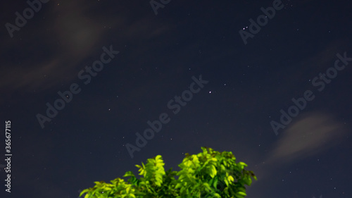 night sky with stars and clouds