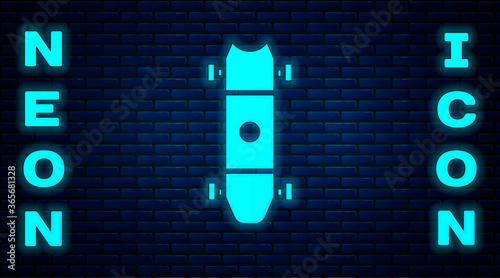 Glowing neon Longboard or skateboard cruiser icon isolated on brick wall background. Extreme sport. Sport equipment. Vector Illustration.