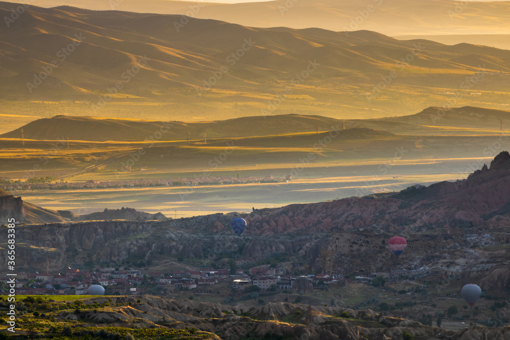 Hot air balloons in Cappadocia / Turkey at sunrise Hot air balloons in Cappadocia / Turkey at sunrise