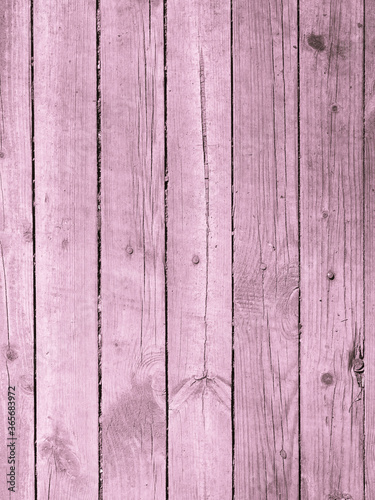 Dark pink board - vintage wooden background, vertical cracks and knots