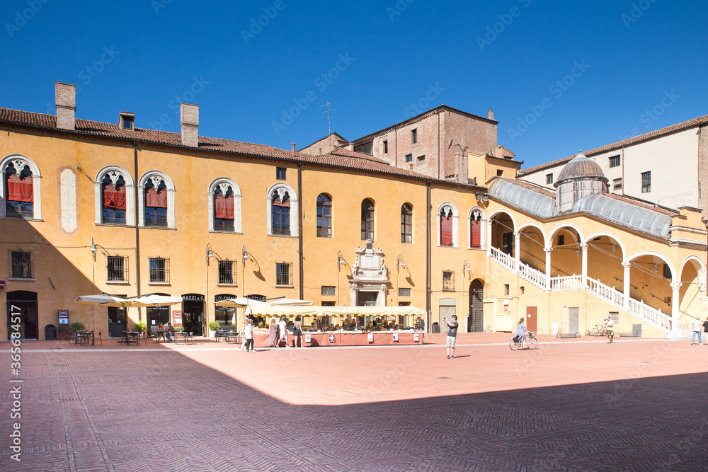 Ferrara, Italy, town hall square in a summer sunny day