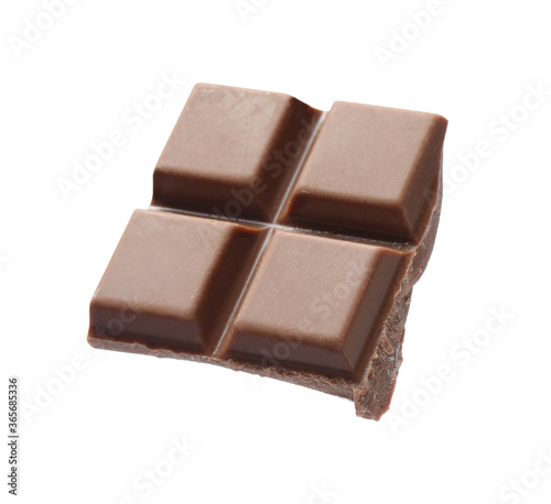 Piece of delicious milk chocolate isolated on white