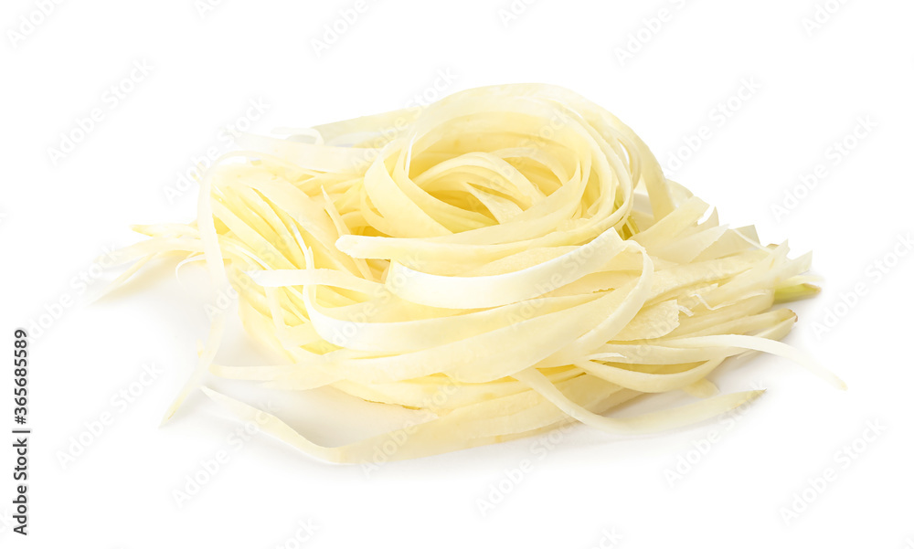 Tasty raw carrot noodles isolated on white Tasty raw carrot noodles isolated on white