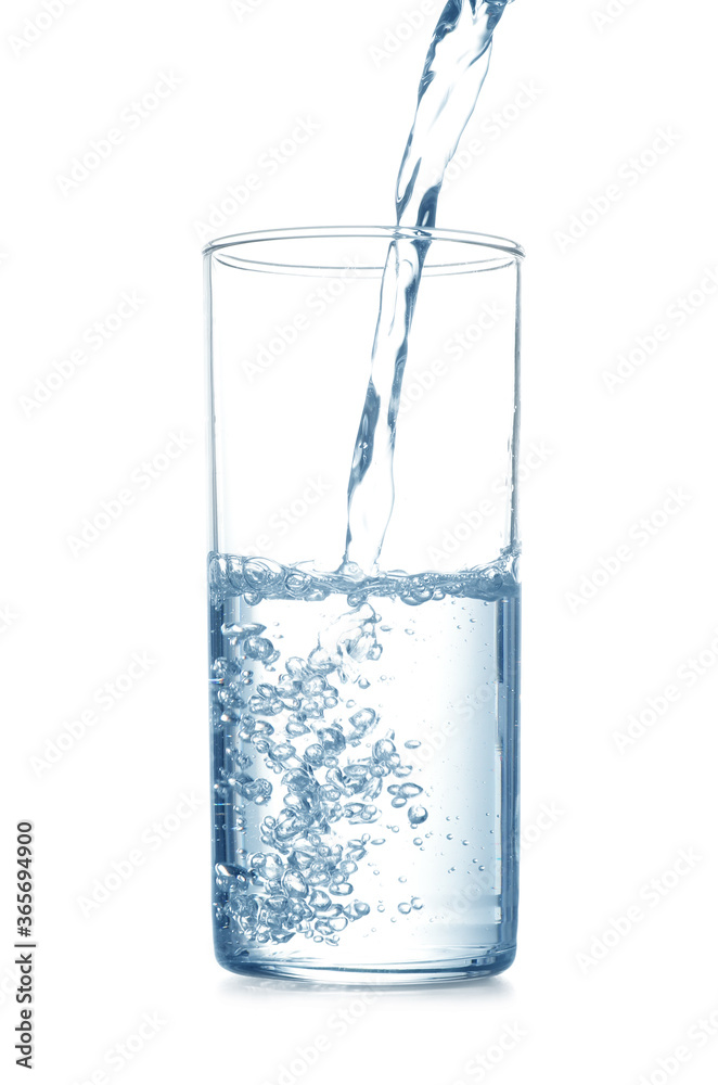 Pouring water into glass on white background Pouring water into glass on white background