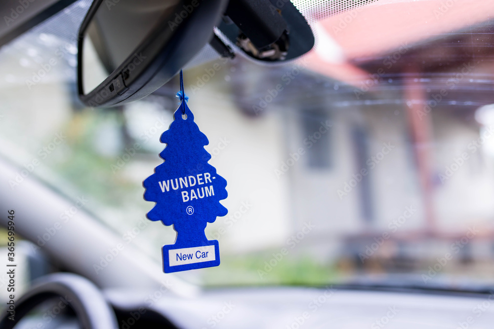 Miercurea Ciuc, Romania- 14 September 2019: Hanging New Car Wunder Baum air  freshener on car interior. Stock Photo