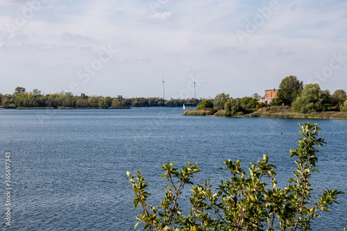 View of the recreation area Kulkwitzer See, a lake on the outskirts of the cities of Leipzig and Markranstädt. A paradise for swimmers, surfers, divers, cyclists and hikers.