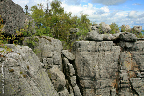 Rock formations in Szczeliniec Wielki in the Stolowe Mountains, the Sudeten range in Poland. The Stolowy Mountains National Park is a great tourist attraction