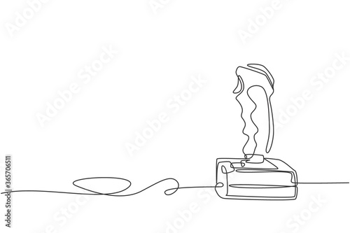One continuous line drawing of retro old classic console video game joystick. Vintage arcade game controller item concept single line draw design graphic vector illustration