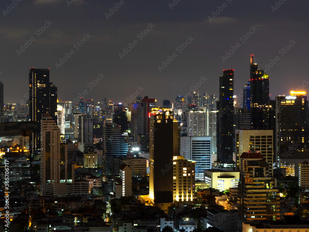 Bangkok cityscape night view in the business district, skyscraper modern building, hotel and resident area with night light in capital city