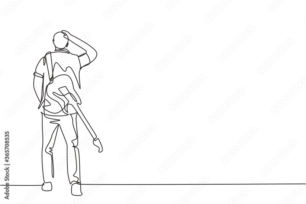 One continuous line drawing of young happy male rock guitarist walking while carrying electric guitar on his shoulder. Musician artist concept single line draw design graphic vector illustration