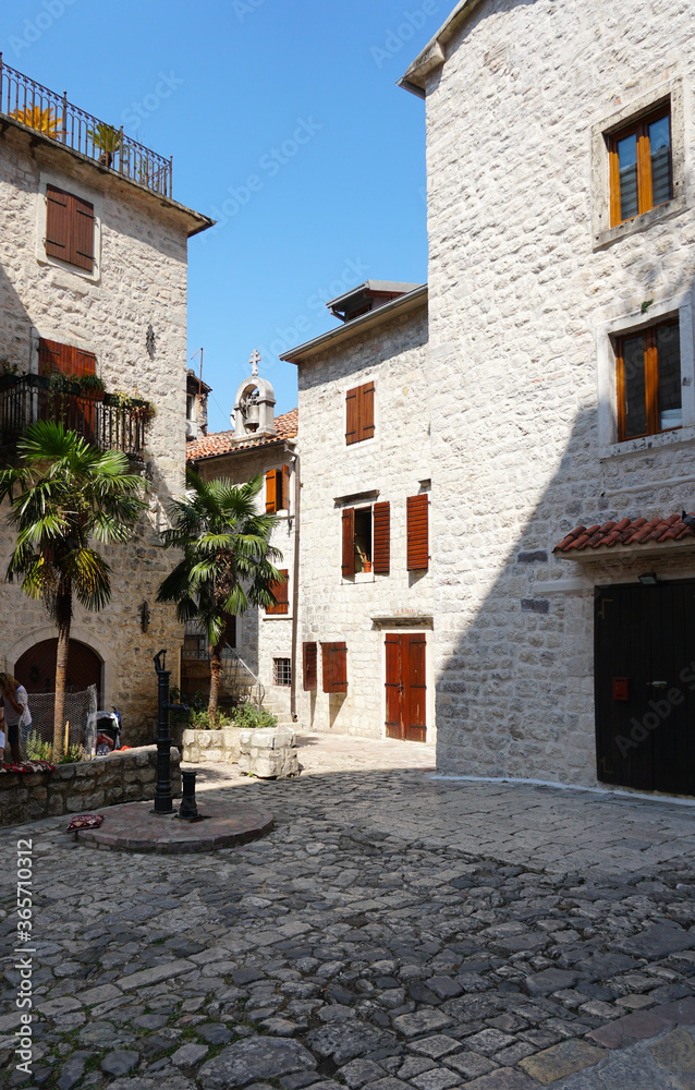 Beautiful elements of old cities in Montenegro. Old town, street, houses windows.