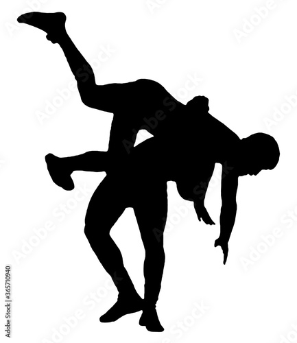 Wrestling. Black silhouettes of wrestlers isolated on a white background photo