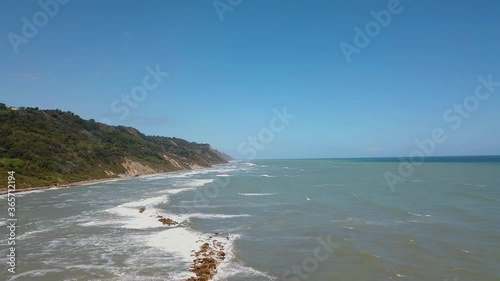 vista aerea del mare di Pesaro verso il parco san bartolo nella regione marche in italia. Il mare è in burrasca photo