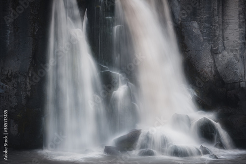 Powerful waterfall in Iceland on a cloudy day