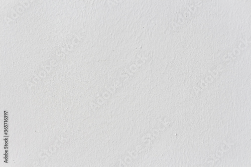 Abstract white color painted cement wall texture background. Copy space for your text and decorations.