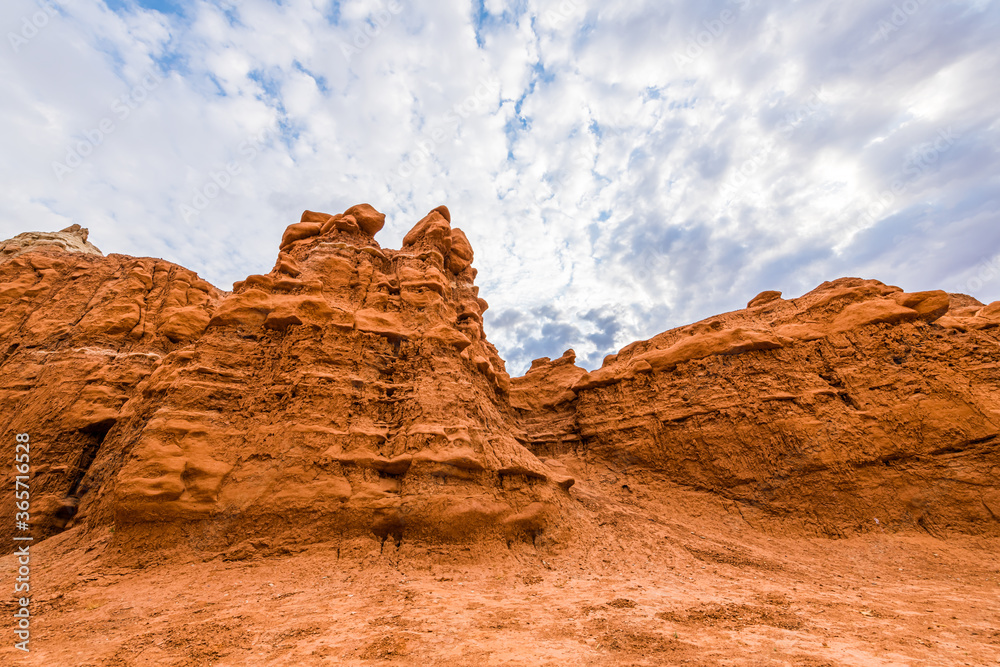 Orange red hoodoo sandstone rock formations view in campground in desert landscape in Goblin Valley State Park, Utah Orange red hoodoo sandstone rock formations view in campground in desert landscape in Goblin Valley State Park, Utah