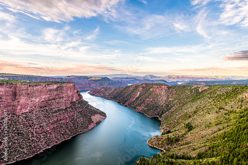 Aerial above view from Canyon Rim trail overlook near campground in Flaming Gorge Utah National Park with Green River at sunset