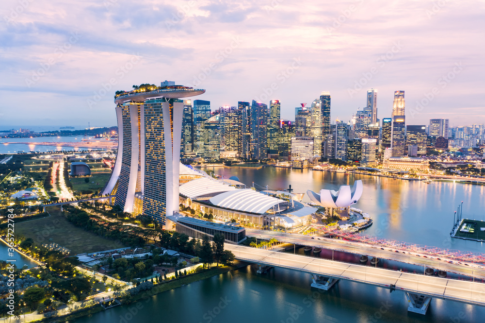View from above, stunning aerial view of the skyline of Singapore during a beautiful sunset with the financial district in the distance. Singapore, 18 July 2020.