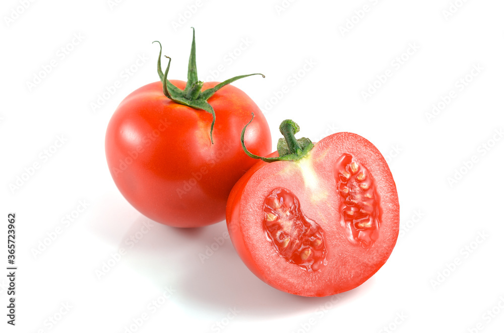 Whole Fresh tomato and half tomatoes on white background. Whole Fresh tomato and half tomatoes on white background.