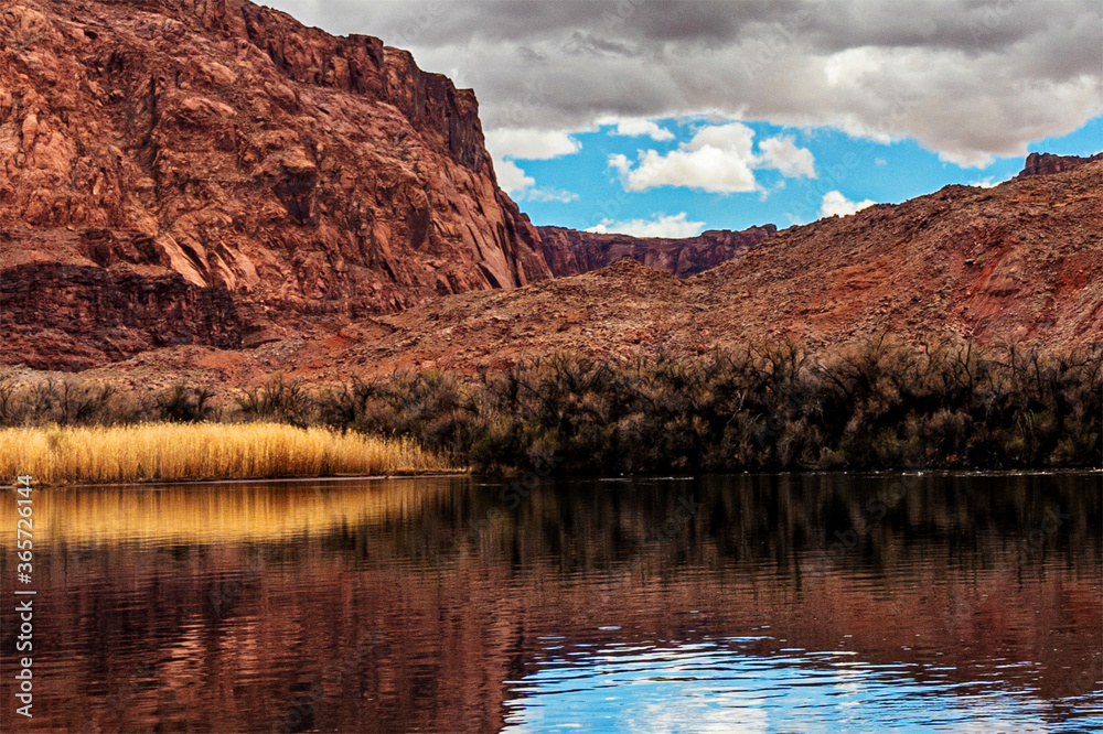 River Colorado acting like a mirror to the surrounding scenery, Lees Ferry landing, Page, AZ, USA