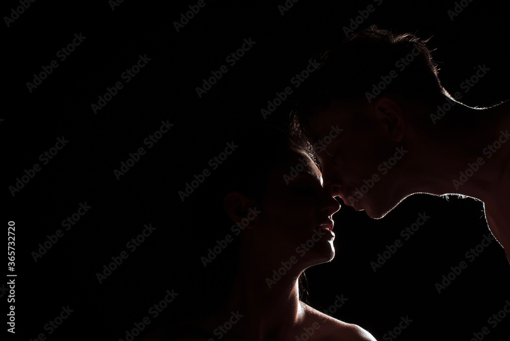 Sexy couple in love. Love couple. Passionate concept. Photo. Dark background. 