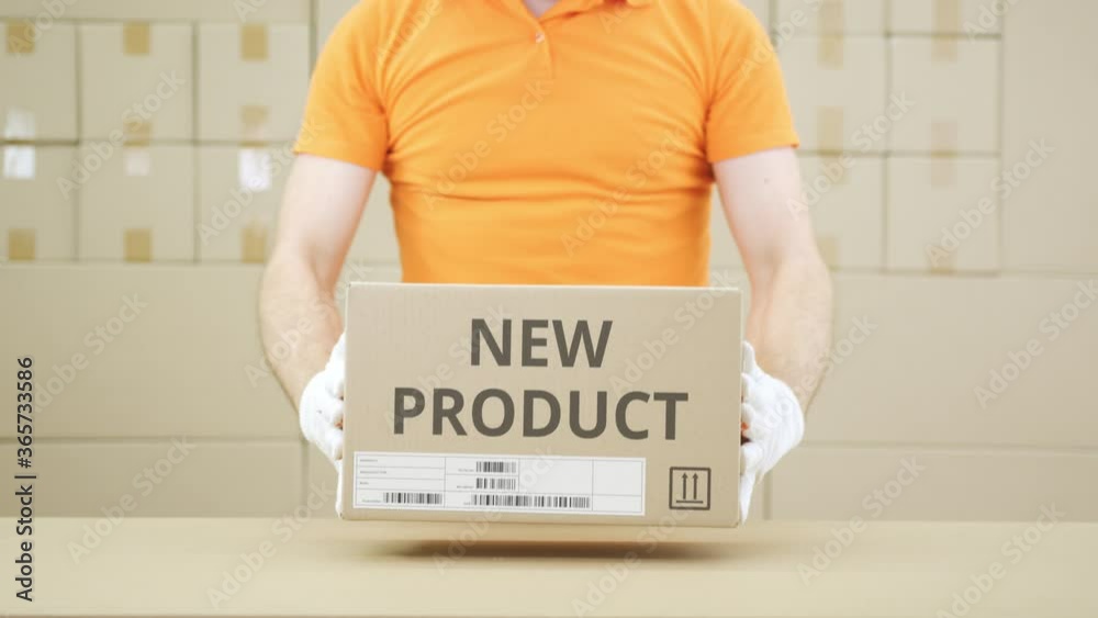 Box with NEW PRODUCT printed text and warehouse worker