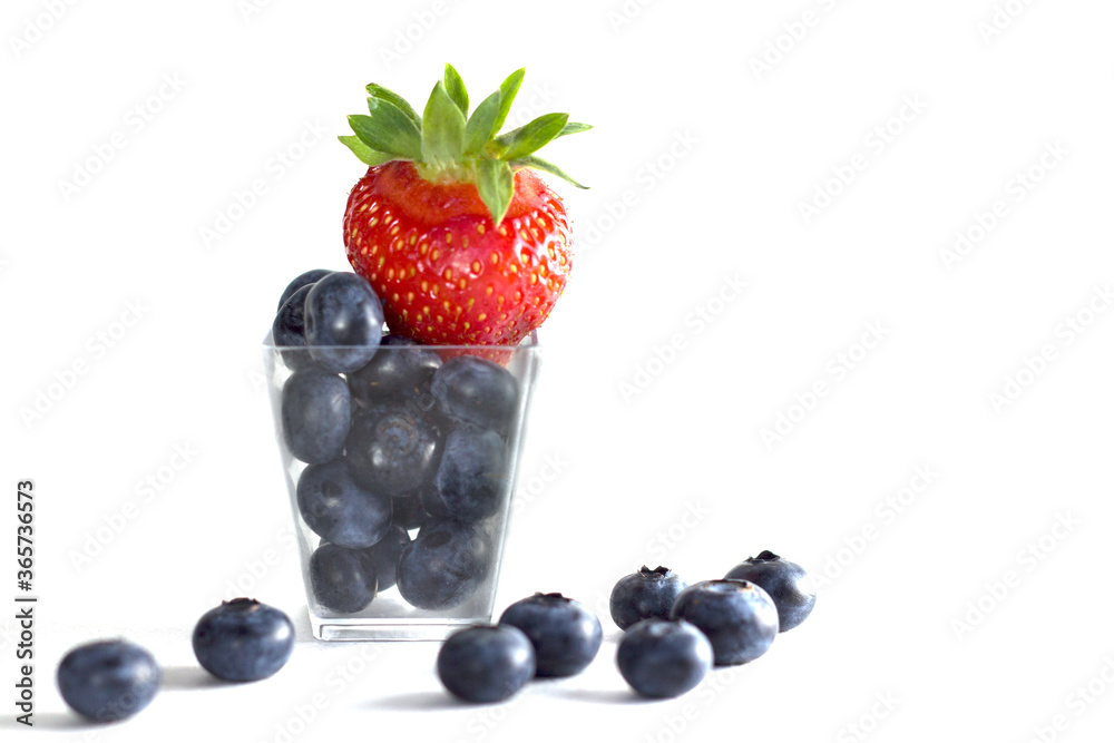 Fresh fruits. Healthy food. Mixed fruits, strawberries and blueberries. Studio photography of various fruits on a white table. Organic healthy assorted fruits. Assortment of fresh fruits. Fruit food b Fresh fruits. Healthy food. Mixed fruits, strawberries and blueberries. Studio photography of various fruits on a white table. Organic healthy assorted fruits. Assortment of fresh fruits. Fruit food b
