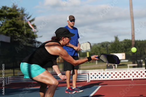 A dink shot during a pickleball match