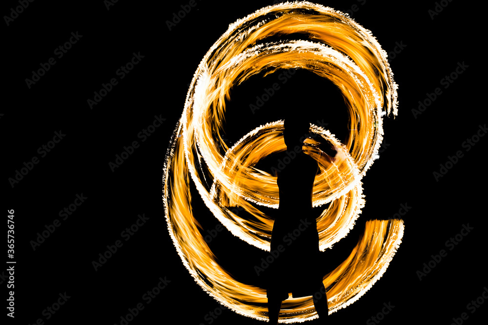 Amazing traditional fire dancing show at night in Thailand. Also known as fire spinning and