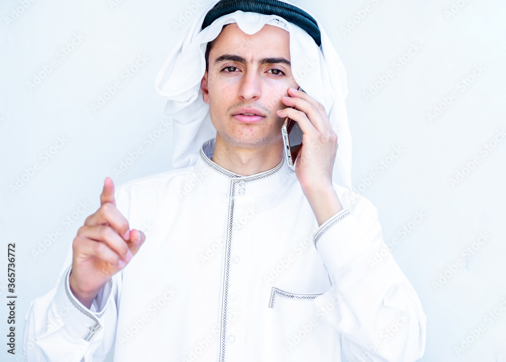 Arabic young businessman having a phone call Arabic young businessman having a phone call