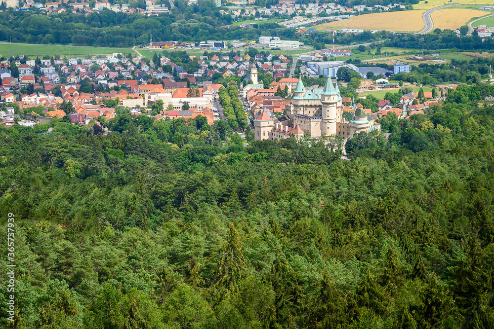 Aerial view of Bojnice castle surrounded by castle park and town of Bojnice (Slovakia)