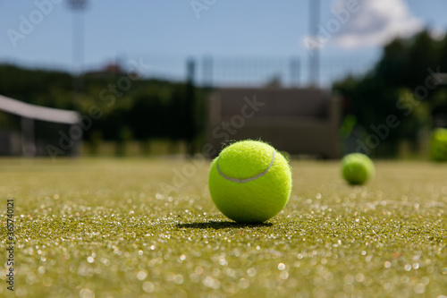 Tennis Ball on the Court Close up © Aliaksandr
