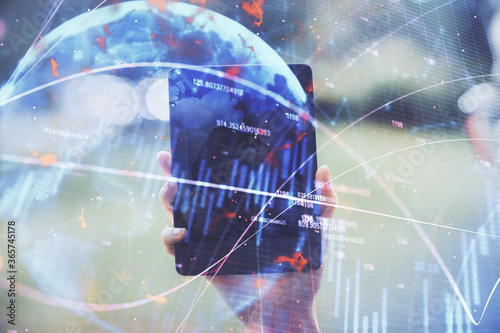 Wallpaper Mural Double exposure of forex chart sketch hologram and woman holding and using a mobile device. Financial market concept. Torontodigital.ca