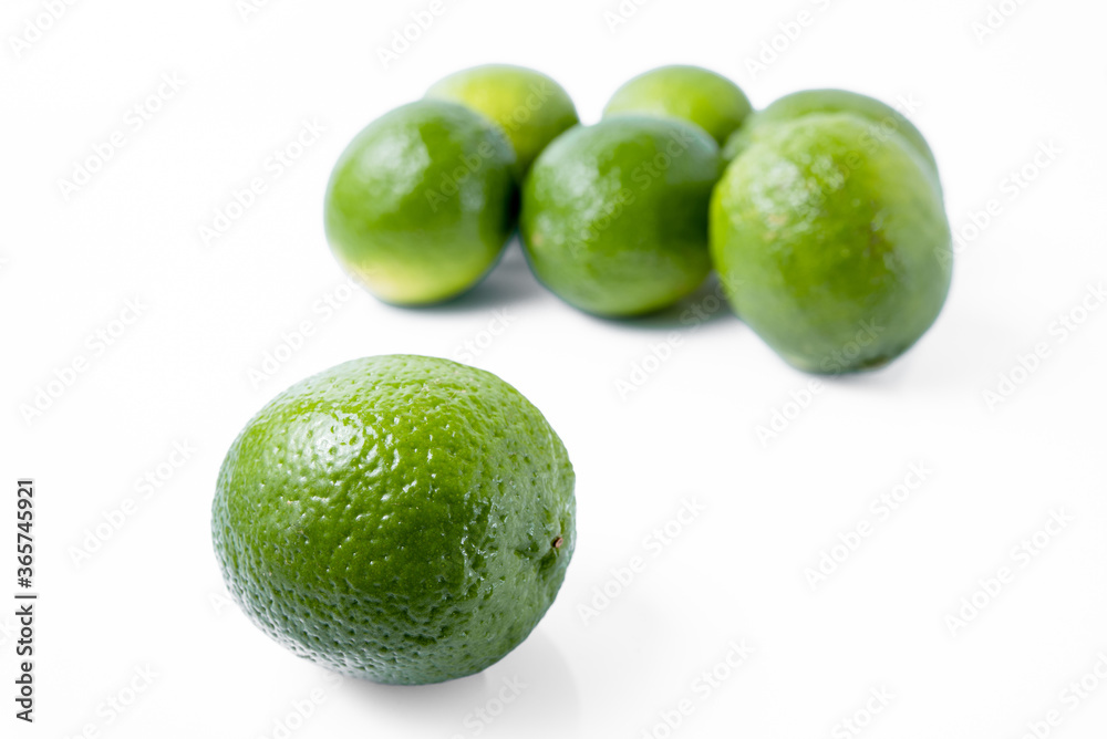 limes isolated on white background limes isolated on white background