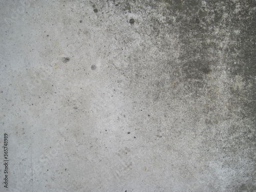 Close-up photo of a dirty concrete floor