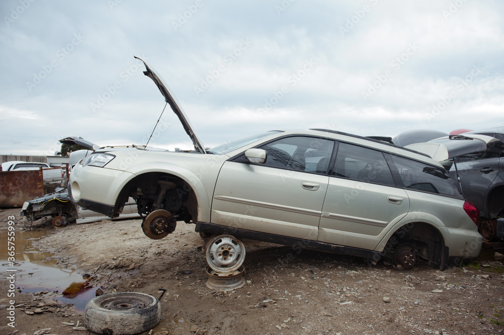Melbourne, Victoria / Australia - July 18 2020: Old wrecked cars in junkyard. Car recycling. Melbourne, Victoria / Australia - July 18 2020: Old wrecked cars in junkyard. Car recycling.