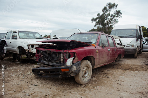 Melbourne, Victoria / Australia - July 18 2020: Old wrecked cars in junkyard. Car recycling. © Olha