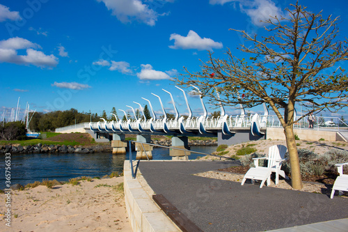 Approach to the new curved Koombana Bay Footbridge in Bunbury, Western Australia with its maritime theme reinforces the importance of the water front to the City.
