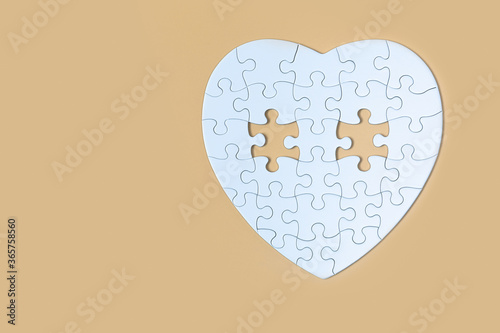 Many white jigsaw puzzle on Yellow background, Business success, idea solution concept.