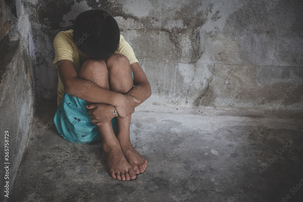 The girl sat depressed in a dark room, Violence against children, Domestic violence, Stop Sexual abuse And human trafficking  Concept, stop violence against Women, international women's day